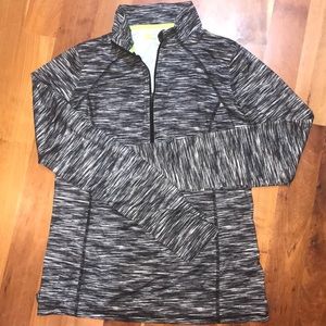 Semi fit Xersion front zip shirt.